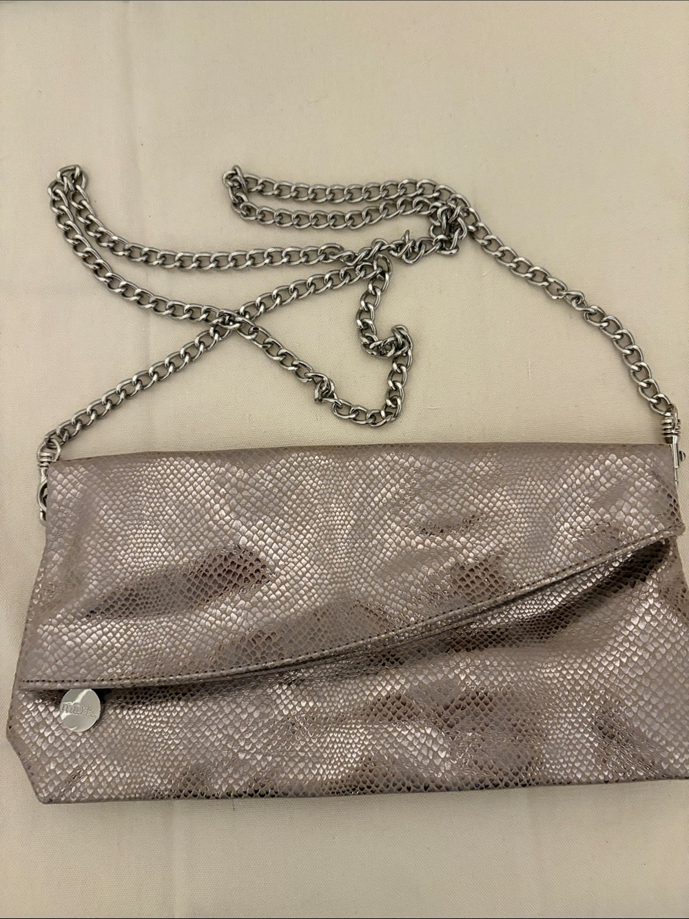 Mark. Metallic Taupe Snake-Embossed Mesh Clutch with detachable silver chain
